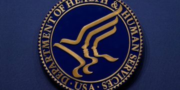 HHS touts universal flu, coronavirus vaccine initiative while casting doubt on future of seasonal Covid-19 shots